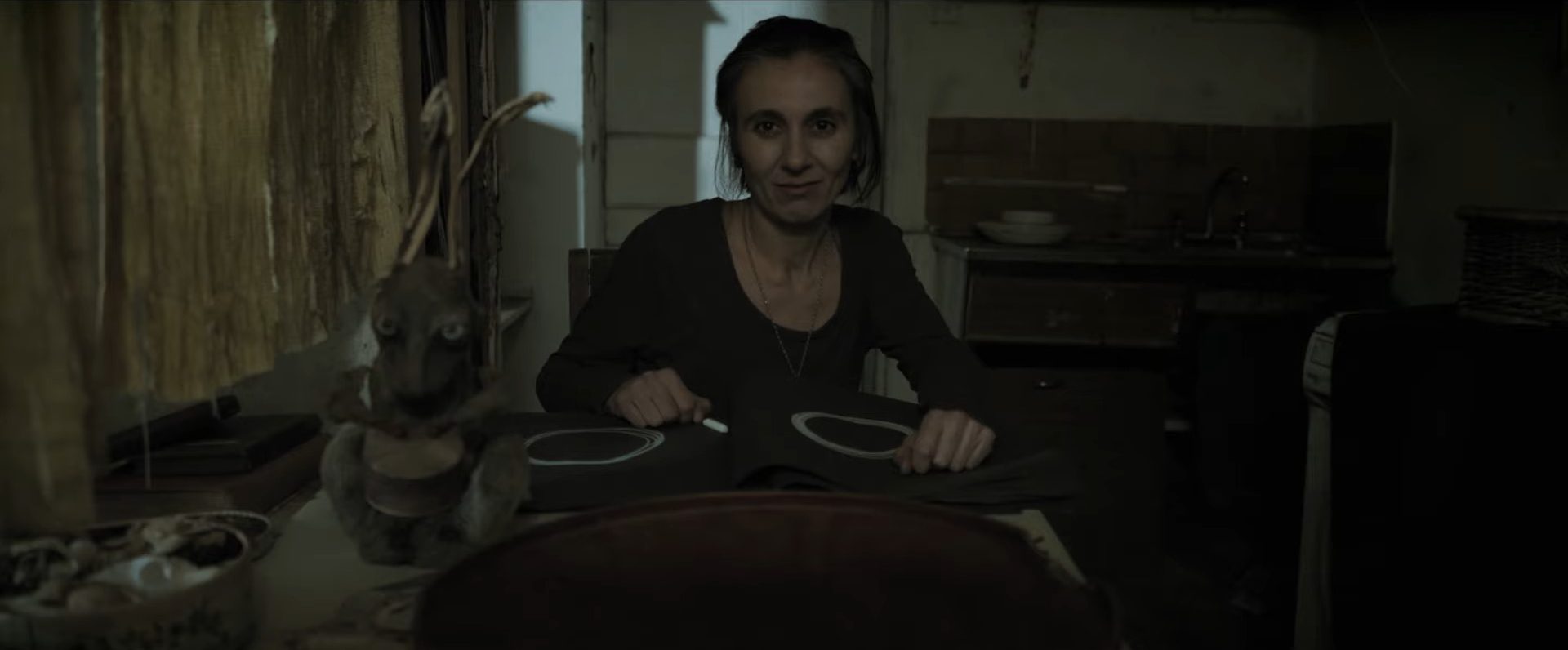 Screenshot from Irish horror movie Caveat (2020)