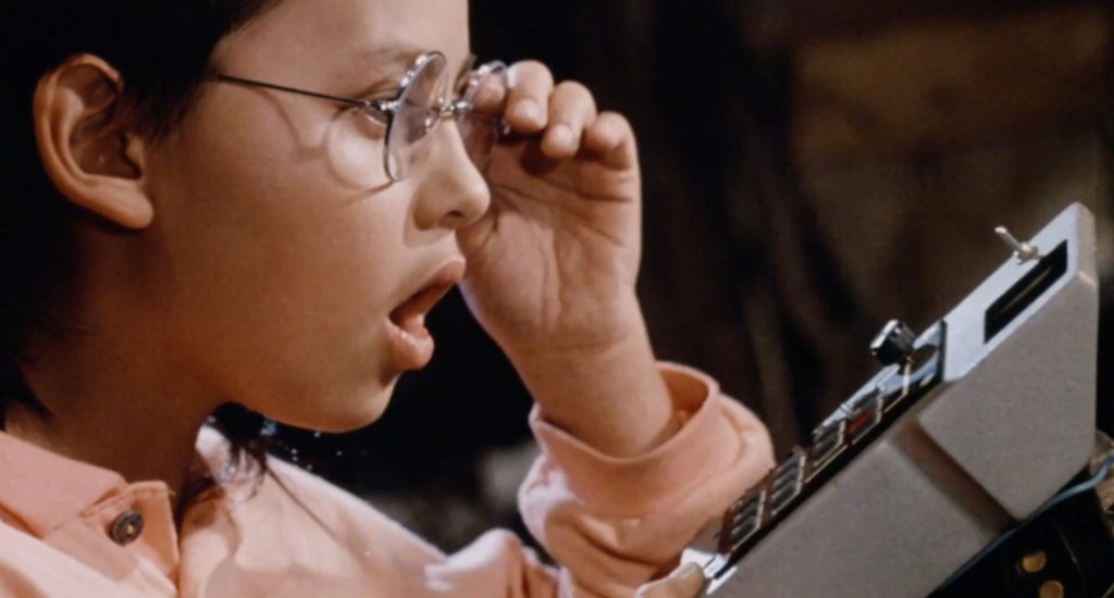 A screenshot from French Christmas horror movie Deadly Games (1989)