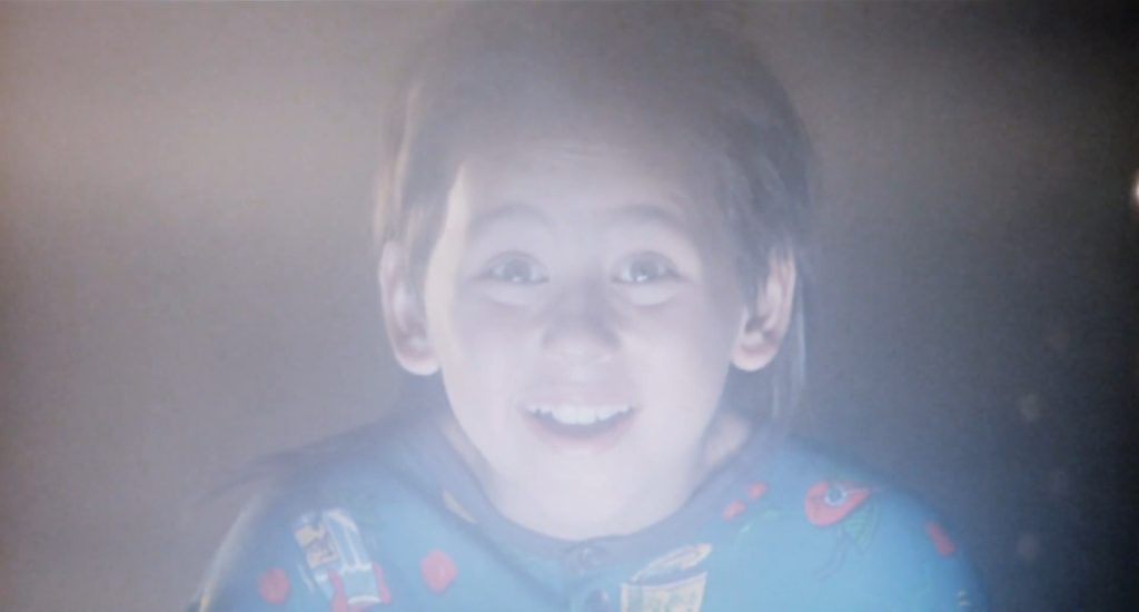 A screenshot from French Christmas horror movie Deadly Games (1989)