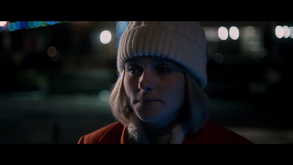A screenshot from Shudder Original Christmas horror It's a Wonderful Knife (2023)