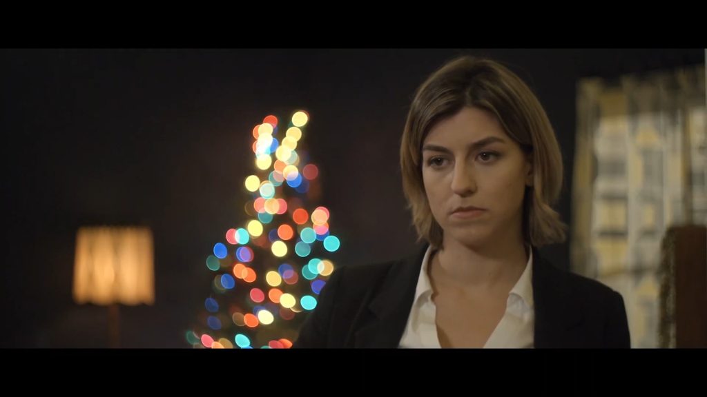 A screenshot from Xmas horror movie The Nights Before Christmas (2019)