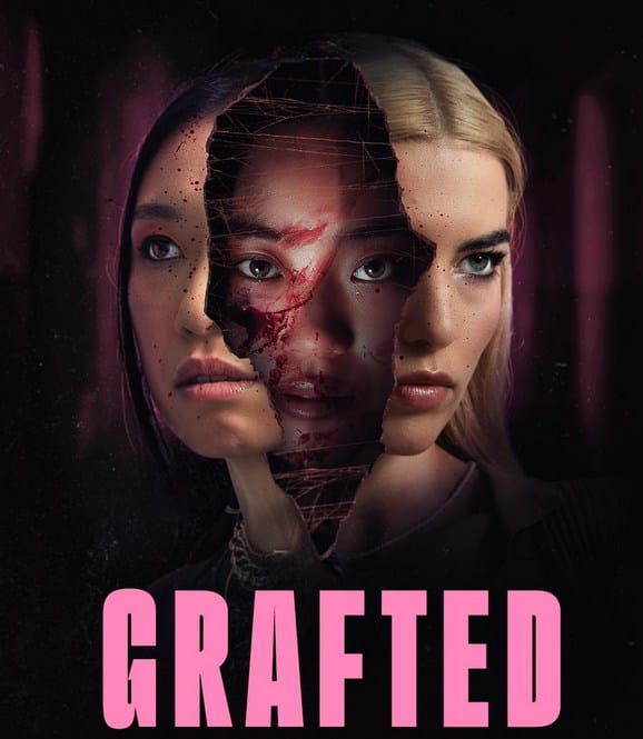 A movie poster for "Grafted." The image features two women's faces blended together with a torn paper effect. A tear down the center reveals a third face underneath, covered in blood with an intense stare. The background is dark purple. The title "GRAFTED" is written in large, bold pink letters at the bottom.