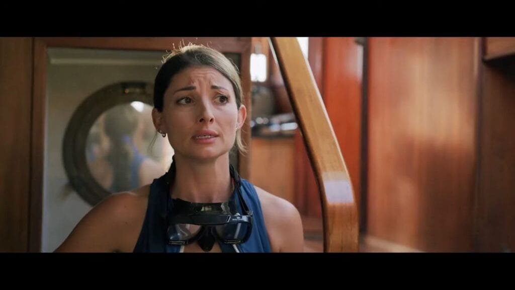 A screenshot from shark themed horror movie Great White Waters (2025)