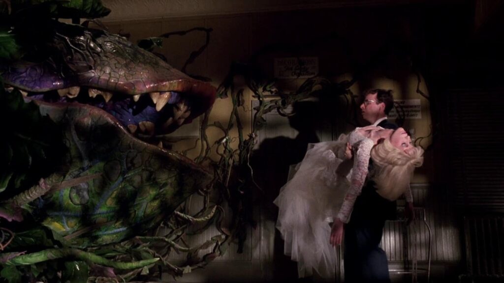 A screenshot from family friendly scary movie Little Shop of Horrors (1986)