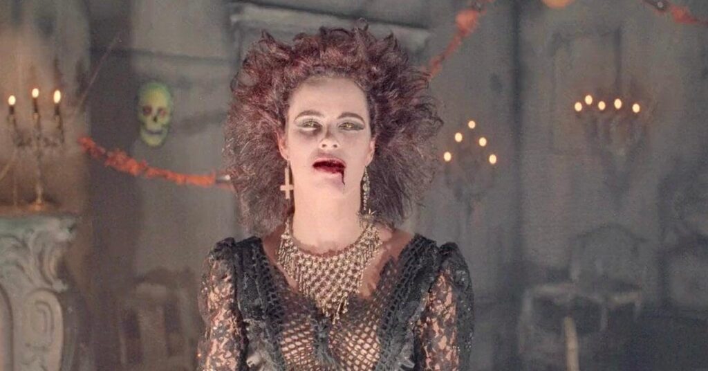 A screenshot from horror movie Night of the Demons (1988)