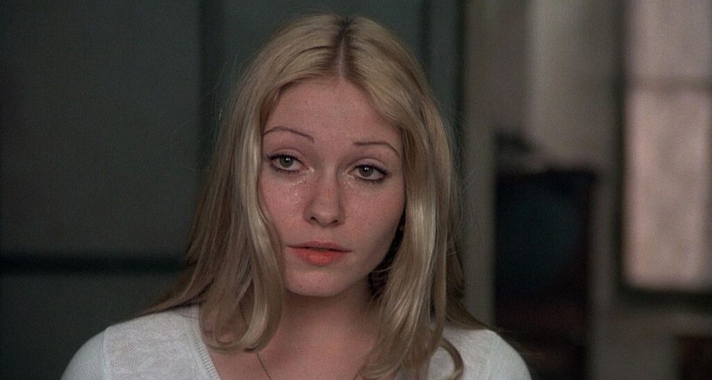 A screenshot from disturbing horror movie Salo Or The 120 days of Sodom (1975)