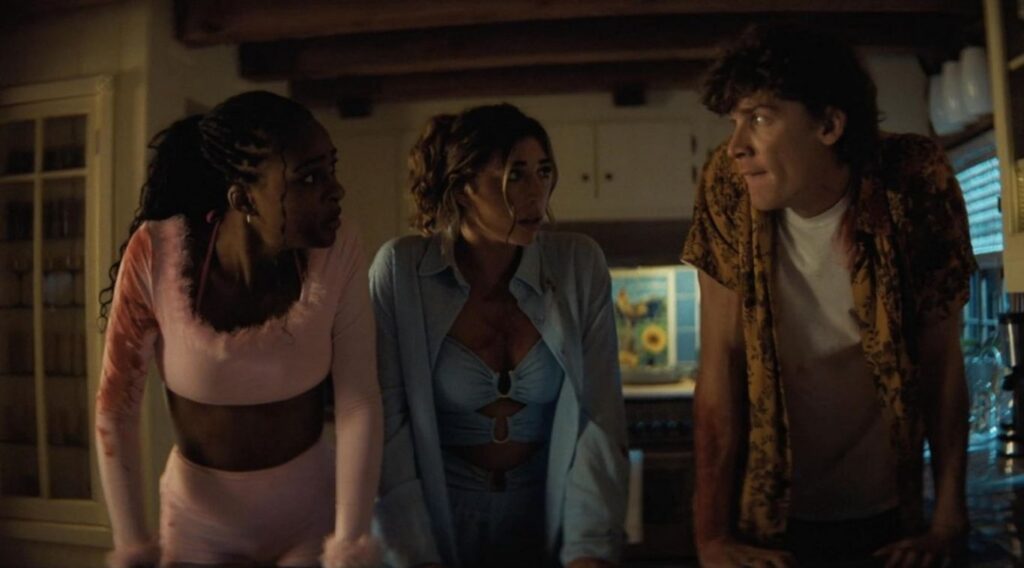 A screenshot from influencer themed, cabin in the woods, Tubi horror movie Glamping (2025)