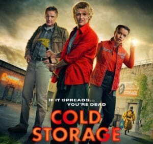 Official movie poster for the 2026 horror-comedy Cold Storage, featuring Liam Neeson as Robert Quinn, Joe Keery as Teacake, and Georgina Campbell as Naomi standing in front of the Atchison Self-Storage facility with the tagline "If it spreads... you're dead."