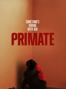 Movie poster for Primate (2025) featuring Ben the chimp sitting in a corner with the tagline "Something's wrong with Ben."