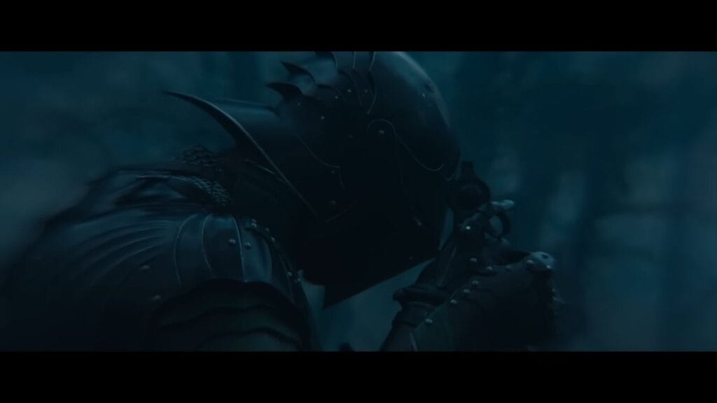 A dark, cinematic shot of Seamus in full black knight armor from the ending of The Dreadful.