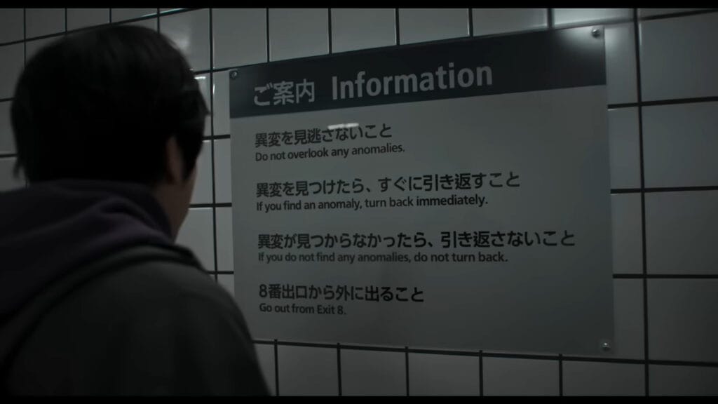 A character reads an official information sign on a subway wall detailing the rules for spotting anomalies and turning back in the horror film Exit 8.