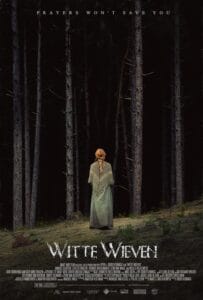 Official movie poster for the Dutch folk-horror film Heresy, originally titled Witte Wieven, showing a young blonde woman from behind looking into a dark, dense forest of tall pine trees.