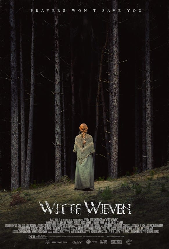 Official movie poster for the Dutch folk-horror film Heresy, originally titled Witte Wieven, showing a young blonde woman from behind looking into a dark, dense forest of tall pine trees.