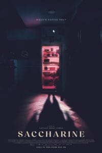 Official movie poster for the horror film Saccharine (2026) showing a dark kitchen where an open refrigerator glows with an ominous pink light, casting a long, monstrous shadow across the floor.