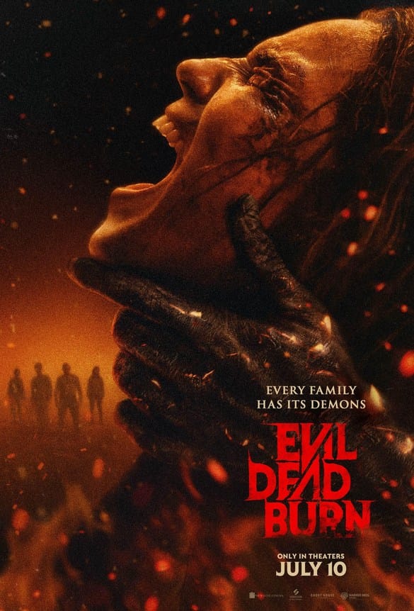 Theatrical movie poster for Evil Dead Burn featuring a charred, demonic hand strangling a screaming woman surrounded by embers and the tagline Every Family Has Its Demons.
