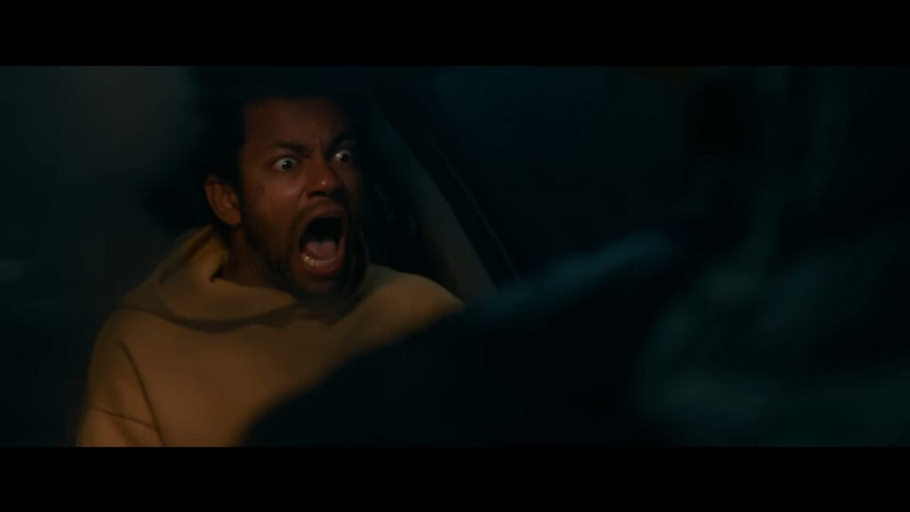 Lucas screaming in absolute shock and terror through a car window, highlighting a crucial plot point for a Passenger ending explained breakdown.