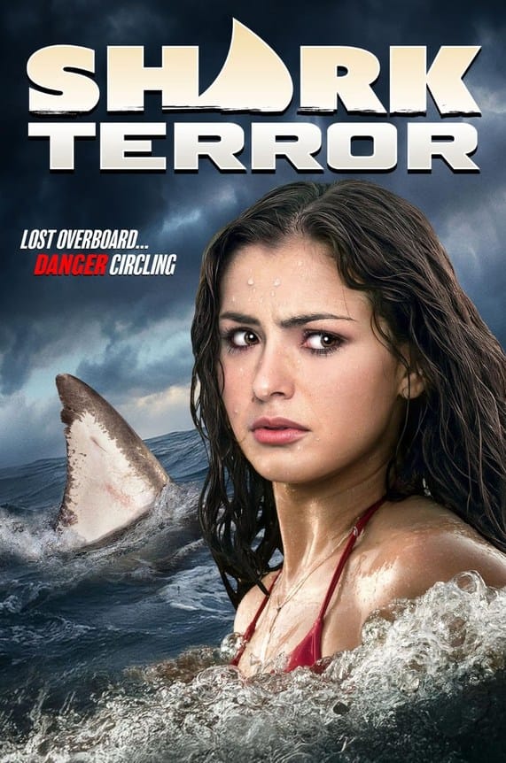 Official movie poster for Shark Terror featuring a distressed woman in the ocean next to a large shark fin under the tagline Lost Overboard Danger Circling.