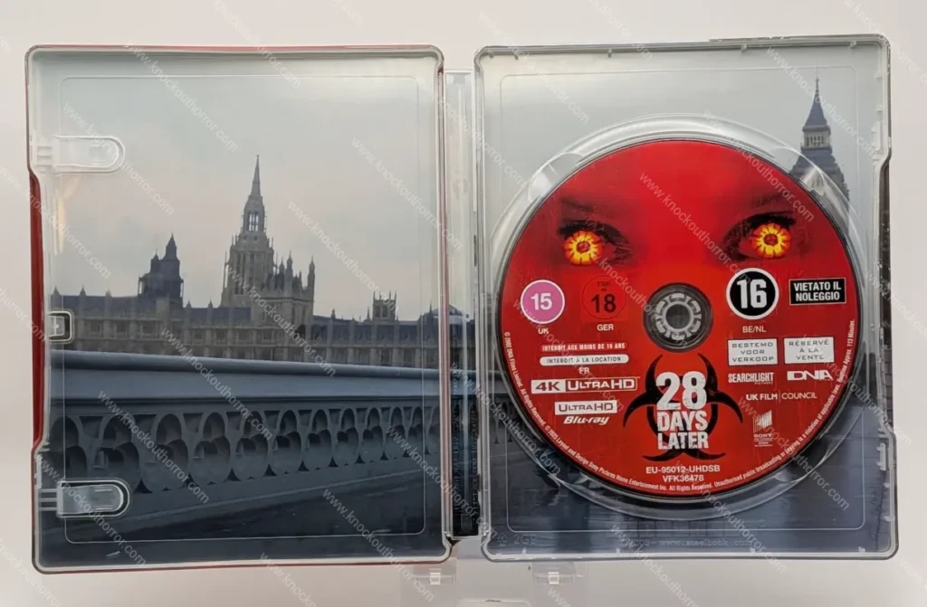 Open 28 Days Later 4K steelbook displaying the single red 4K Ultra HD disc seated over the Westminster Bridge interior artwork.
