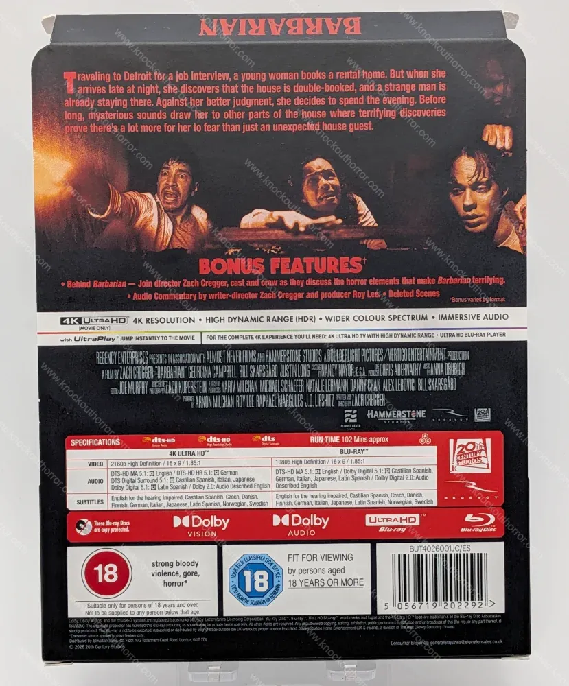 Back of the cardboard J-card for the Barbarian UK 4K steelbook displaying film stills of Justin Long, bonus features, and technical audio/video specs.