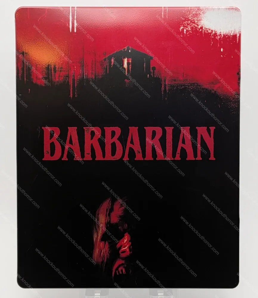 Front cover artwork of the Barbarian 4K steelbook case featuring a red and black grungy illustration of the house at 476 Barbary with glossy typography.