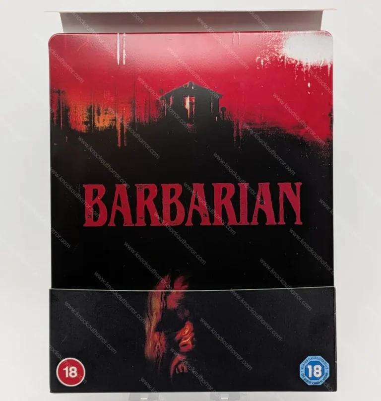 Front view of the Barbarian 4K steelbook housed in its black wrap-around cardboard pocket J-card, showing the BBFC 18 certificate and title font.