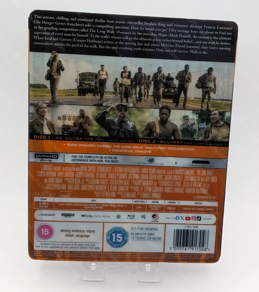Back of the plastic slipcover for The Long Walk 4K UK steelbook displaying movie stills, disc specifications, and special features list.