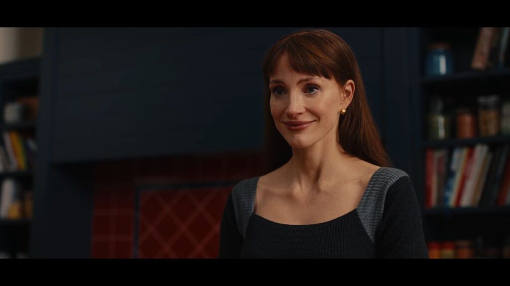 Jessica Chastain smiling gently in a kitchen setting in Other Mommy.