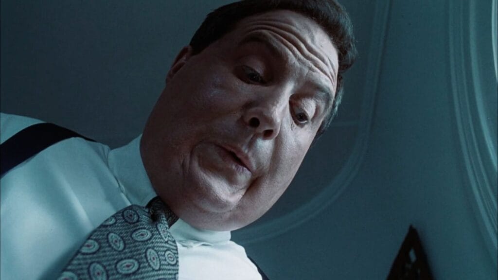 Robert John Burke as attorney Billy Halleck in the horror movie Thinner (1996).