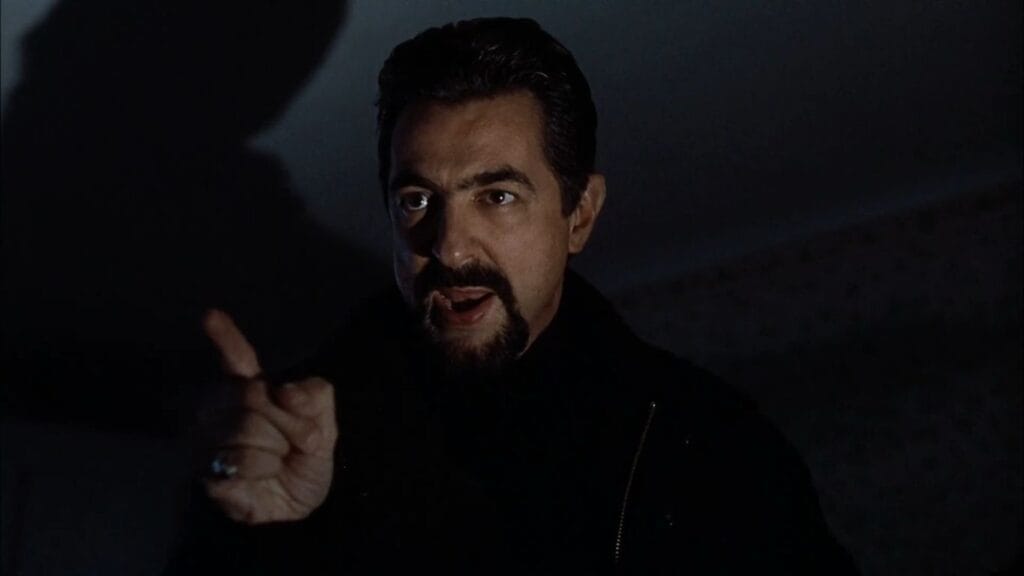 Joe Mantegna as mob enforcer Richie Ginelli in the horror movie Thinner (1996).
