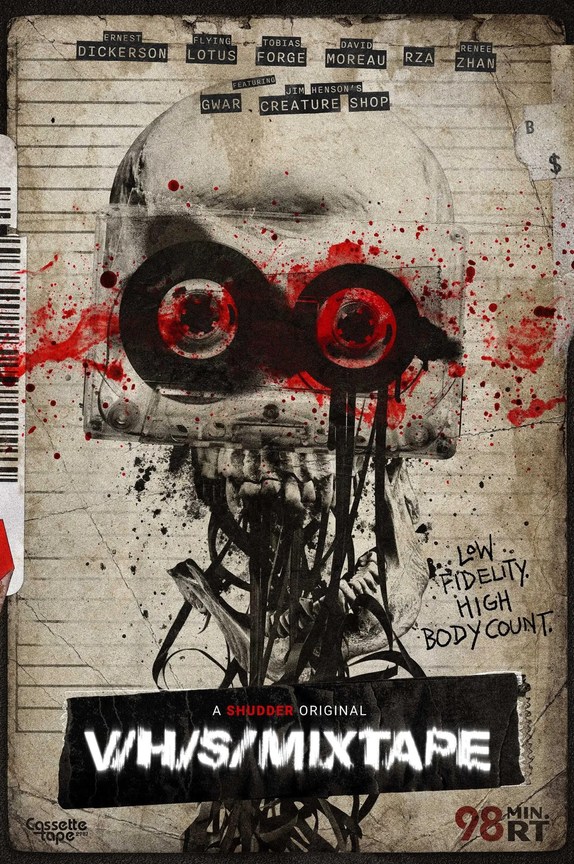 Official Shudder release poster for V/H/S/Mixtape featuring a skull with a bloody audio cassette over its eyes and tangled black tape spilling from its mouth.